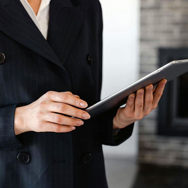 chauffeur holding a tab