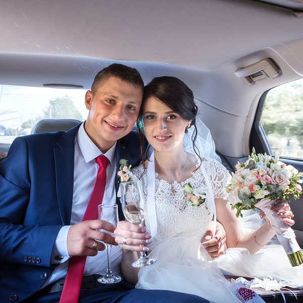 wedding transport in a luxury car